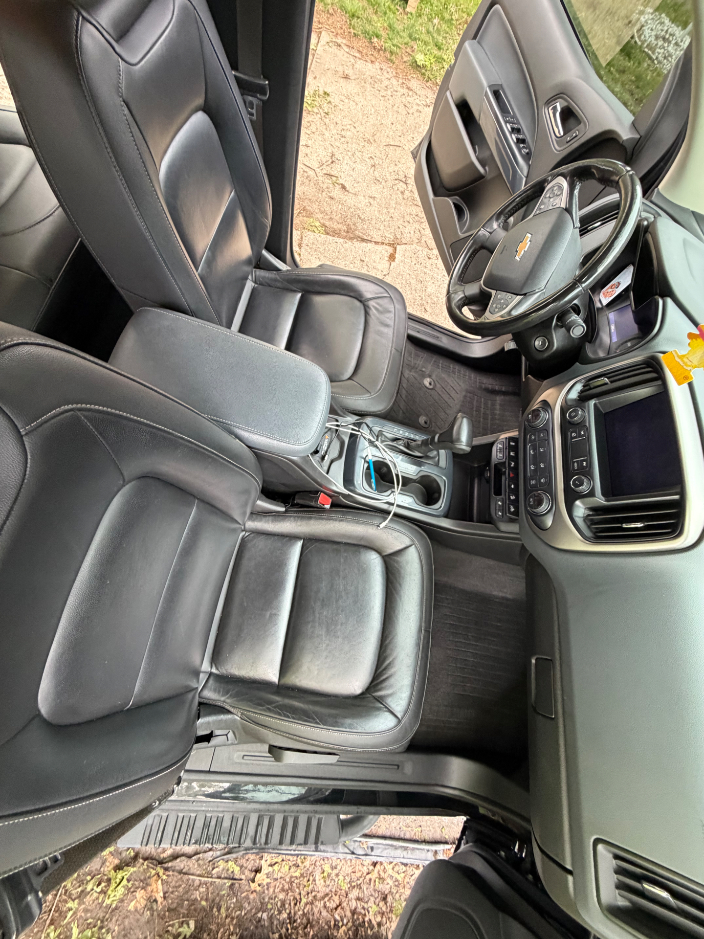 Detailed leather front seats, dash, and console